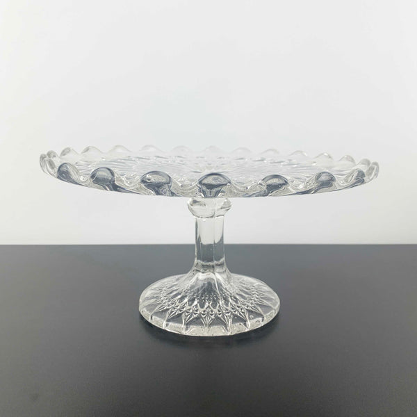 Vintage pressed glass footed cake stand