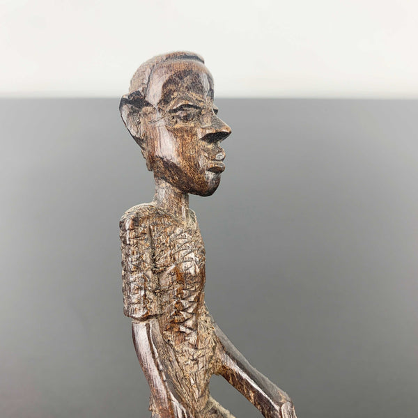 Miniature vintage hand carved timber tribal figurine