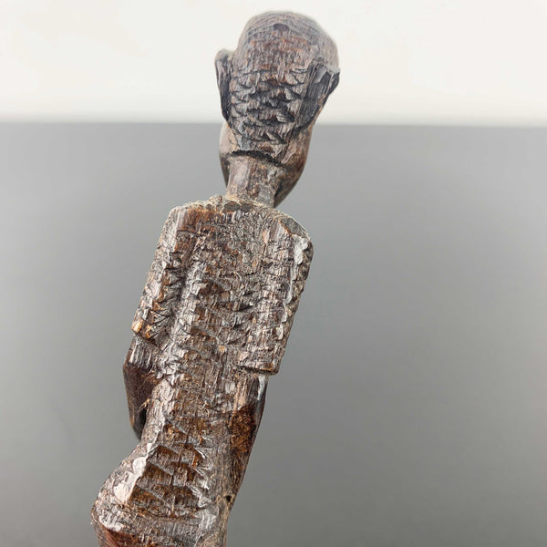 Miniature vintage hand carved timber tribal figurine