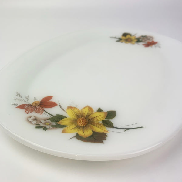 Pyrex oval platter with yellow flower pattern