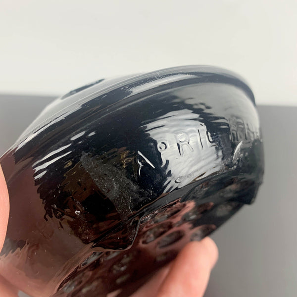 Antique black glass 16 hole flower frog c1916