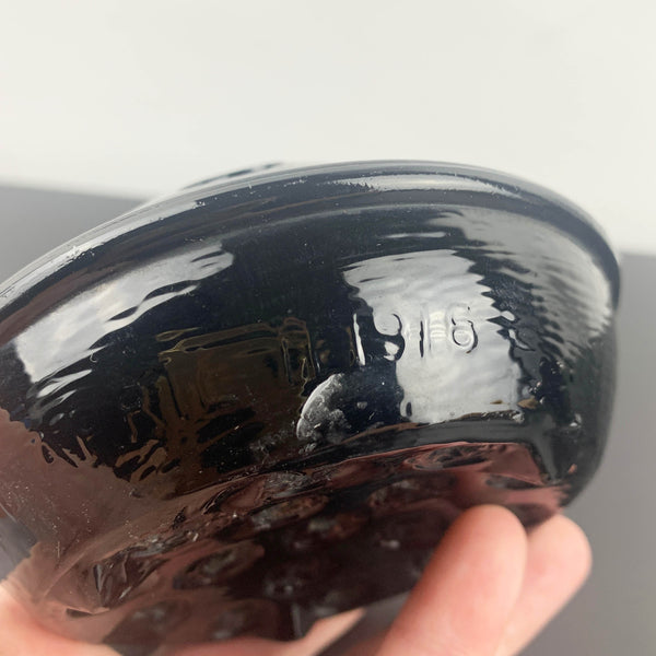Antique black glass 16 hole flower frog c1916