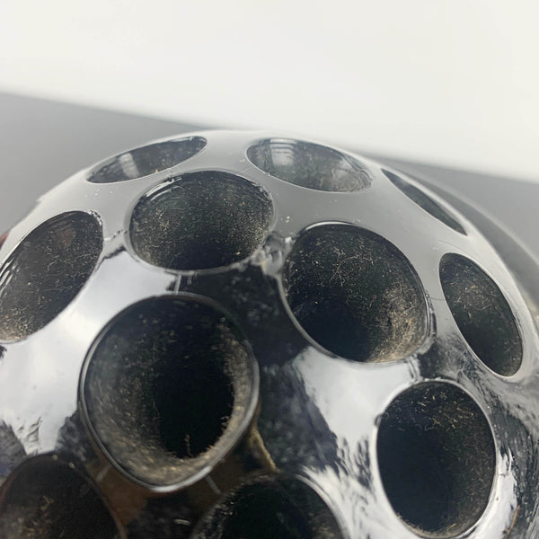 Antique black glass 16 hole flower frog c1916