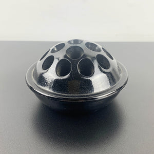 Antique black glass 16 hole flower frog c1916