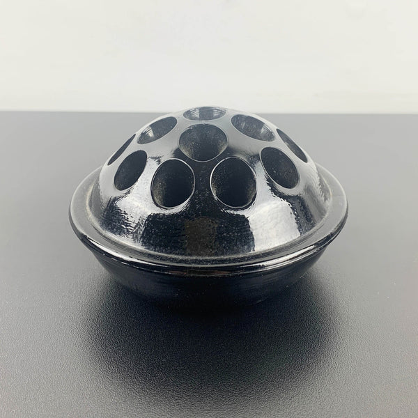 Antique black glass 16 hole flower frog c1916