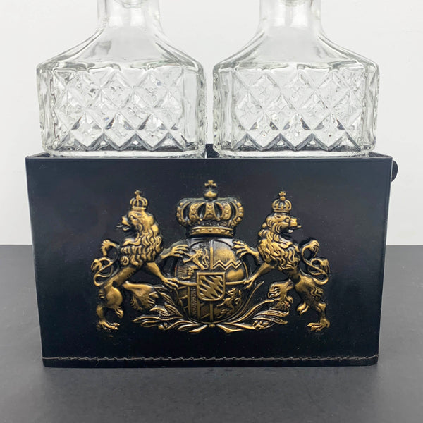 Brama Davidson twin glass decanter set in carrier with coat of arms