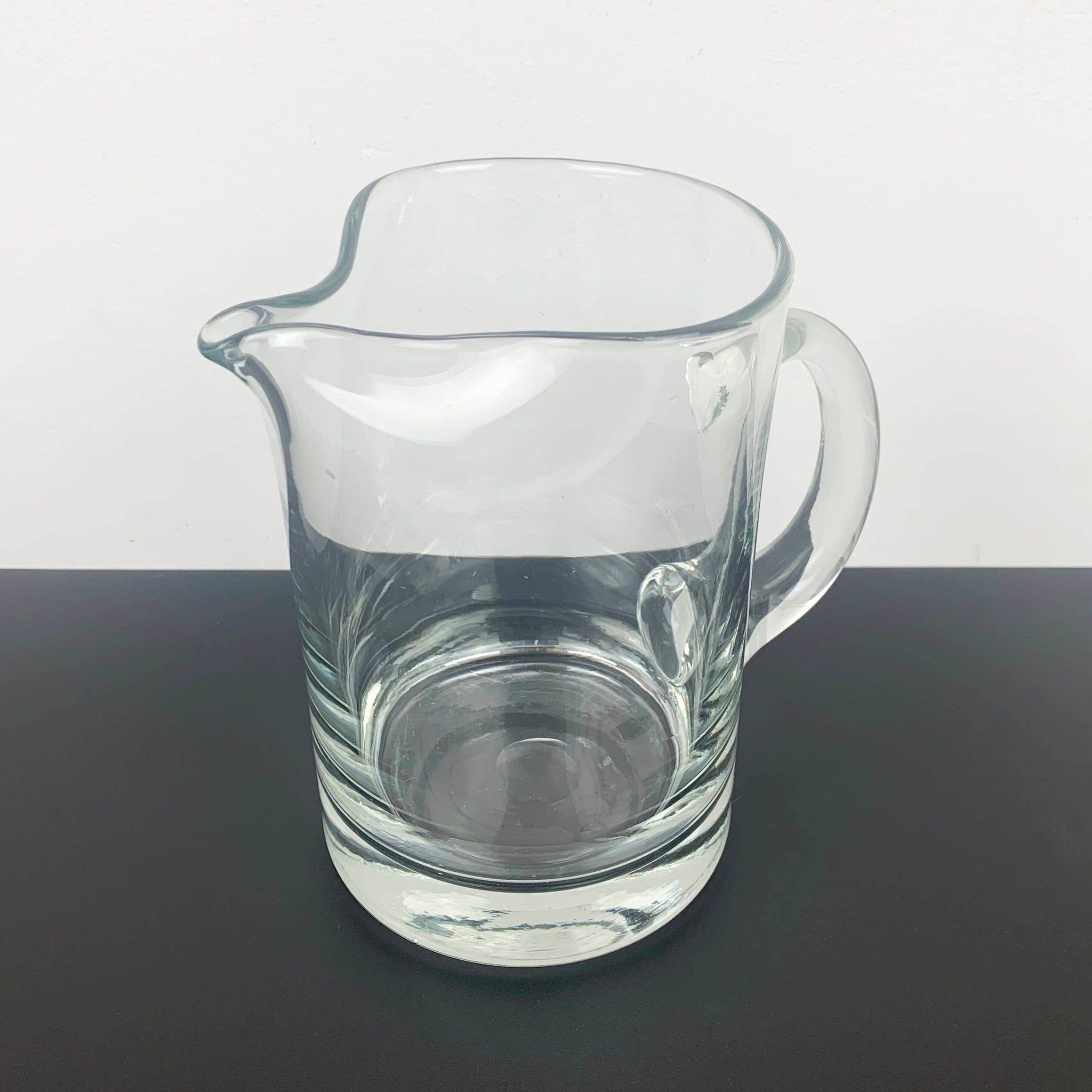 Hand blown pinched spout glass jug