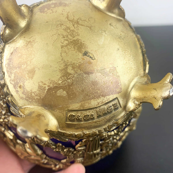 Corbell & Co ornate cherub footed bowl with cobalt blue glass insert