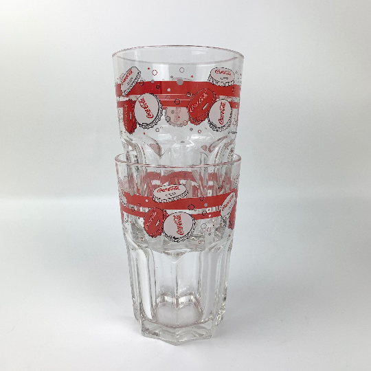 Coca Cola collectible glasses stacked