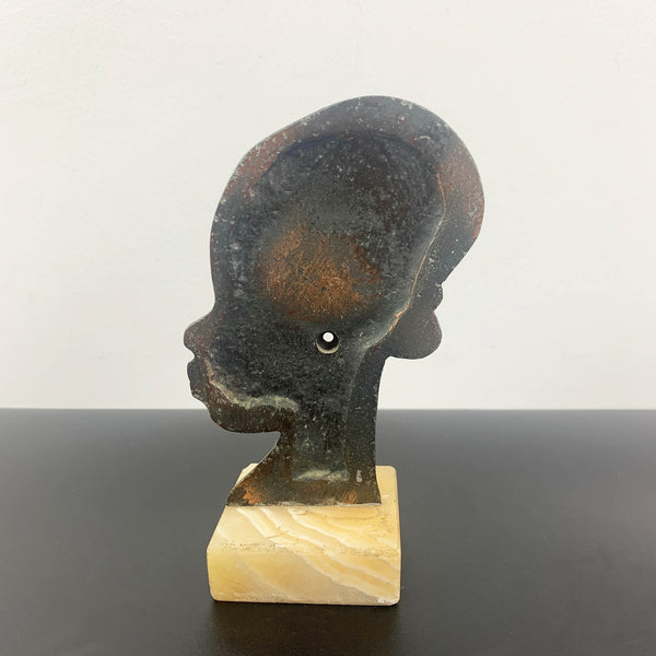 Copper African woman head sculpture on marble base