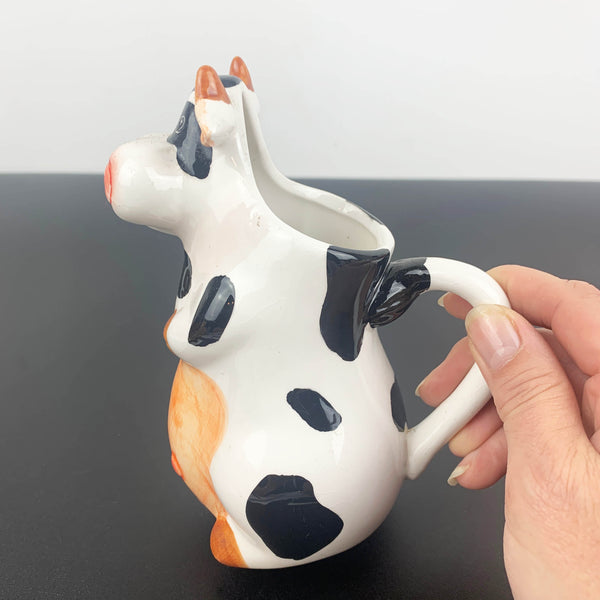 Figural tall cow milk and sauce jug