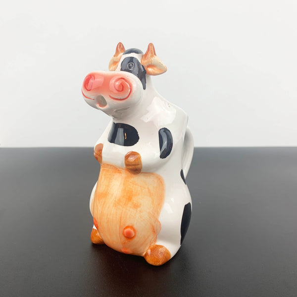 Figural tall cow milk and sauce jug