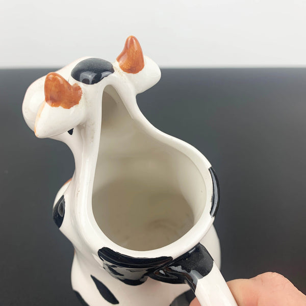 Figural tall cow milk and sauce jug