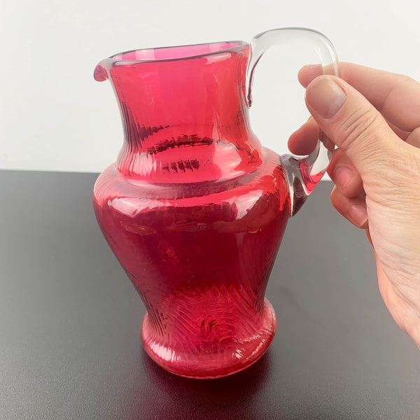 Small antique cranberry glass hand blown jug