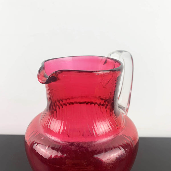Small antique cranberry glass hand blown jug