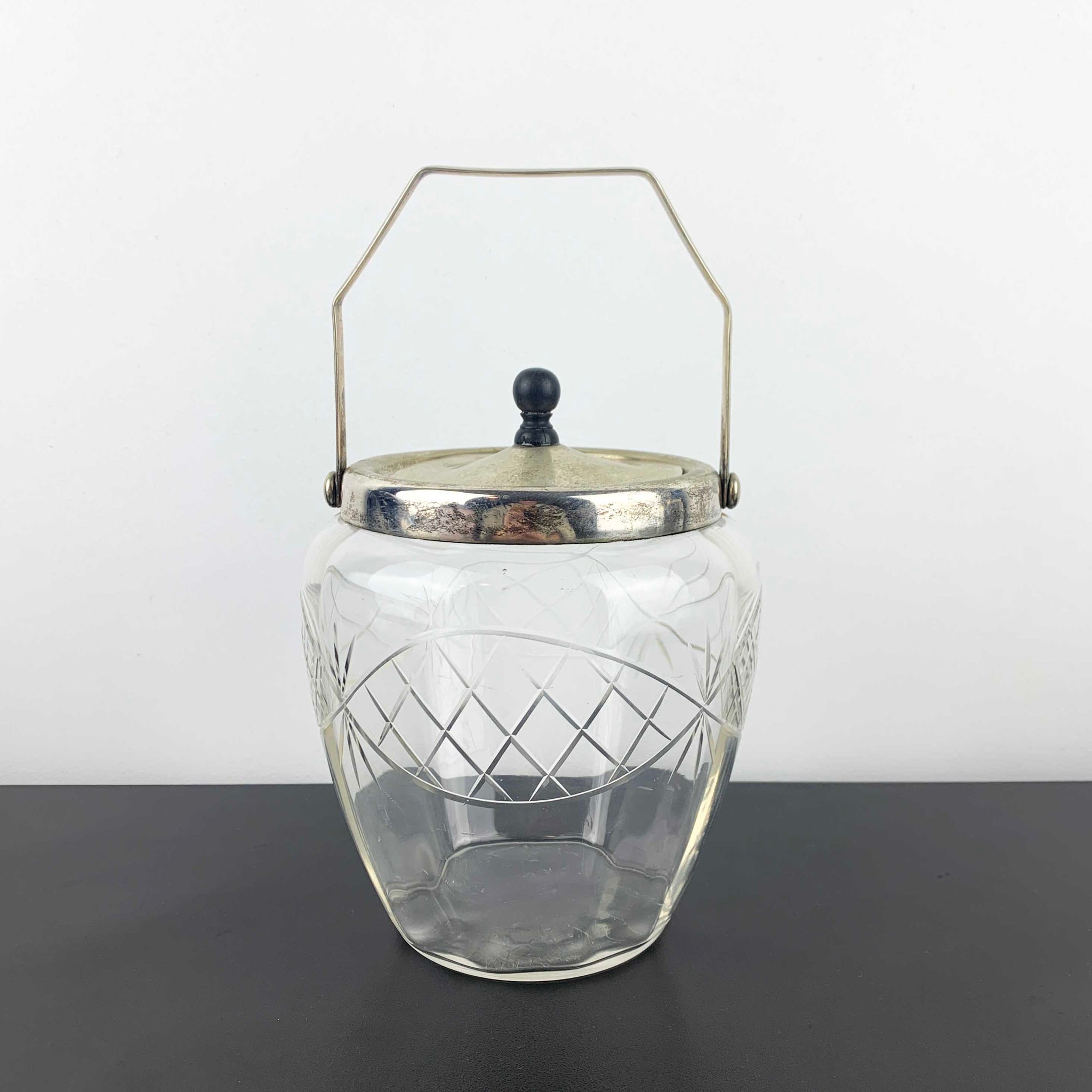 Antique crystal biscuit barrel with EPNS lid and bakelite knob
