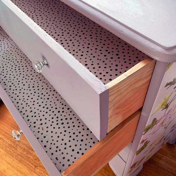 Chest of drawers with floral side detail
