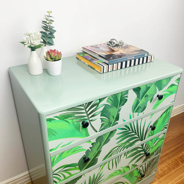 Upcycled 4 drawer chest featuring a fern design artwork.