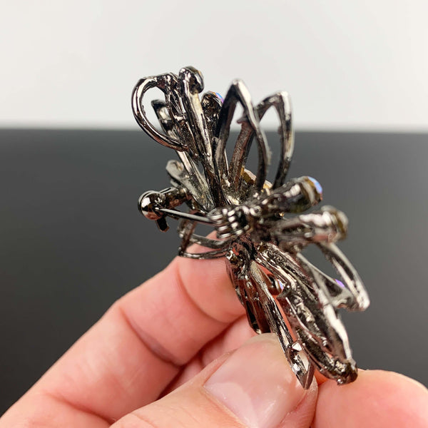 Mid century flower shaped amber rhinestone brooch
