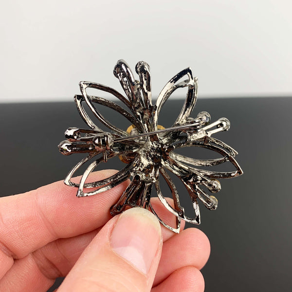 Mid century flower shaped amber rhinestone brooch