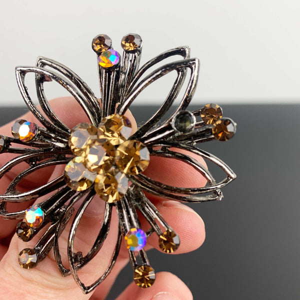 Mid century flower shaped amber rhinestone brooch