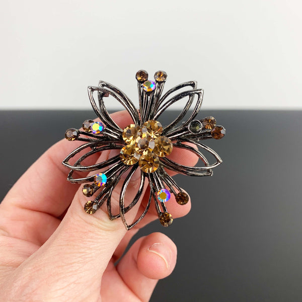 Mid century flower shaped amber rhinestone brooch
