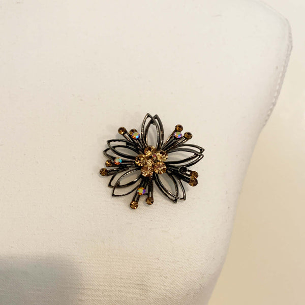 Mid century flower shaped amber rhinestone brooch