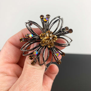 Mid century flower shaped amber rhinestone brooch