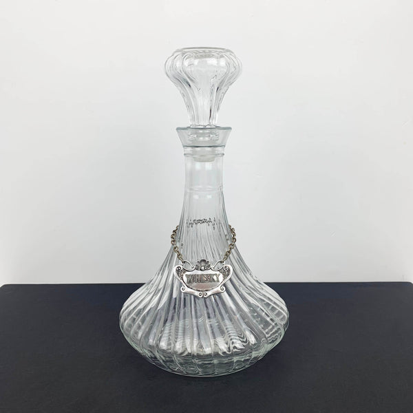 Genie style glass decanter with whisky tag displayed