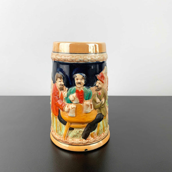 German relief moulded pottery beer stein
