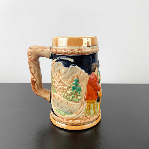 German relief moulded pottery beer stein