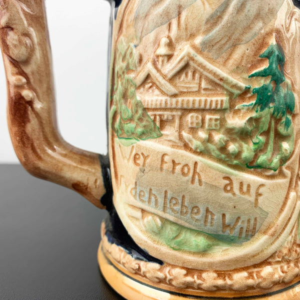 German relief moulded pottery beer stein