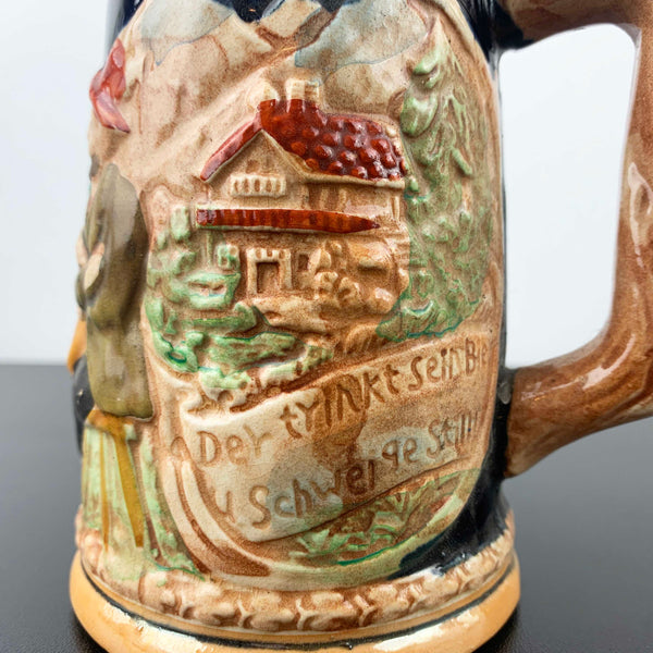 German relief moulded pottery beer stein
