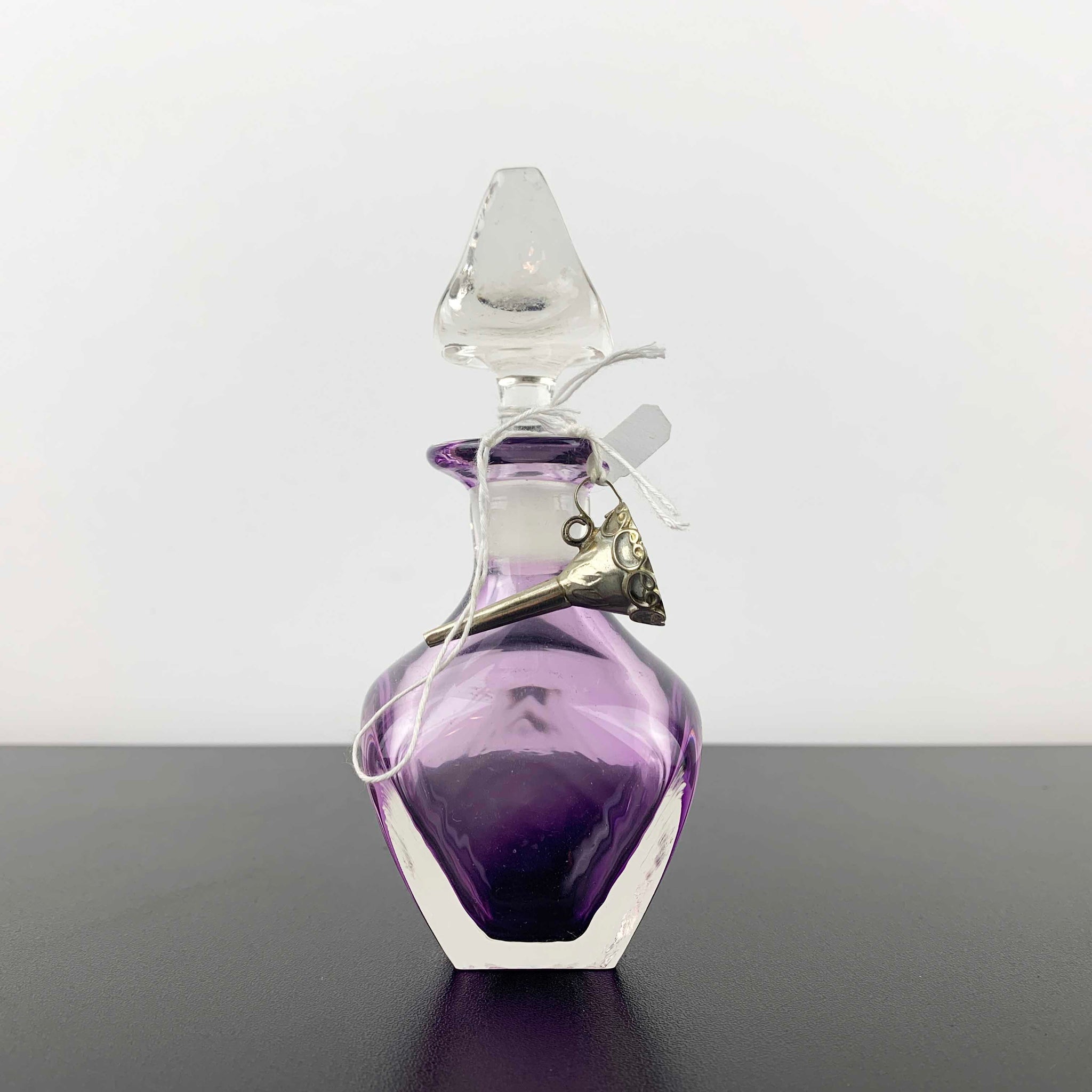 Eileen Gordon violet art glass perfume bottle with silver pouring funnel