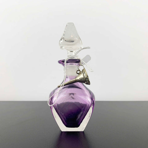 Eileen Gordon violet art glass perfume bottle with silver pouring funnel