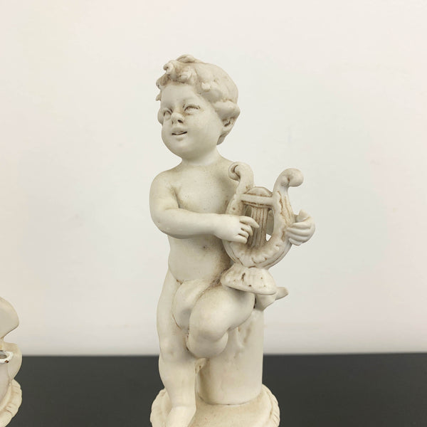 Benacchio (Triade) signed cherub figurines - Set of 2