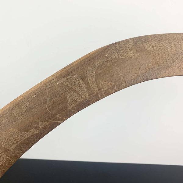 Aboriginal hand made boomerang with intricate carved kangaroo art