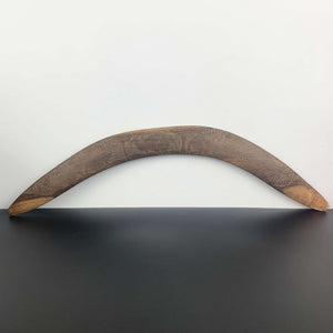 Aboriginal hand made boomerang with intricate carved kangaroo art