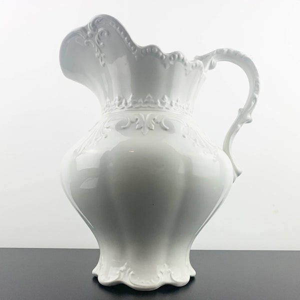 Large embossed ceramic wash jug