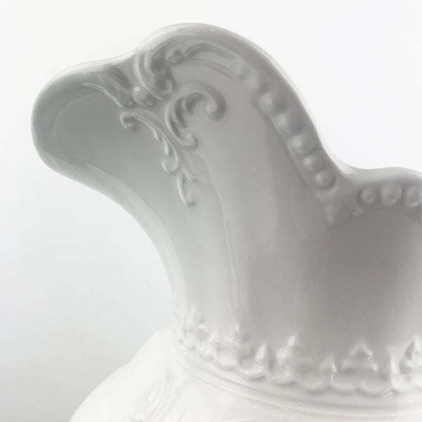 Large embossed ceramic wash jug