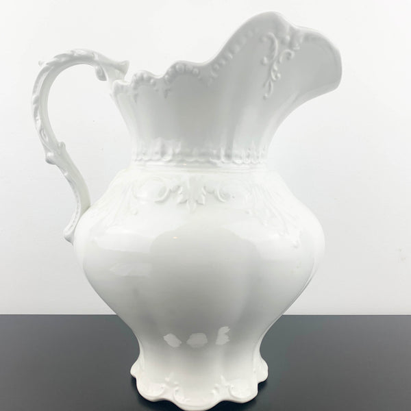 Large embossed ceramic wash jug