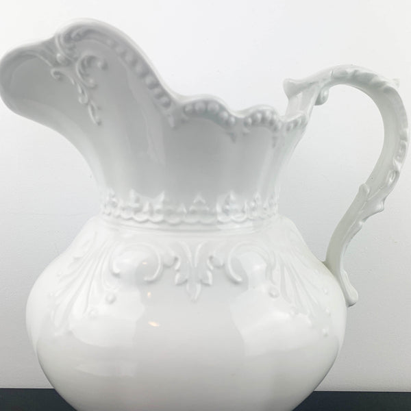 Large embossed ceramic wash jug