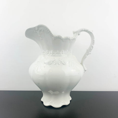 Large embossed ceramic wash jug