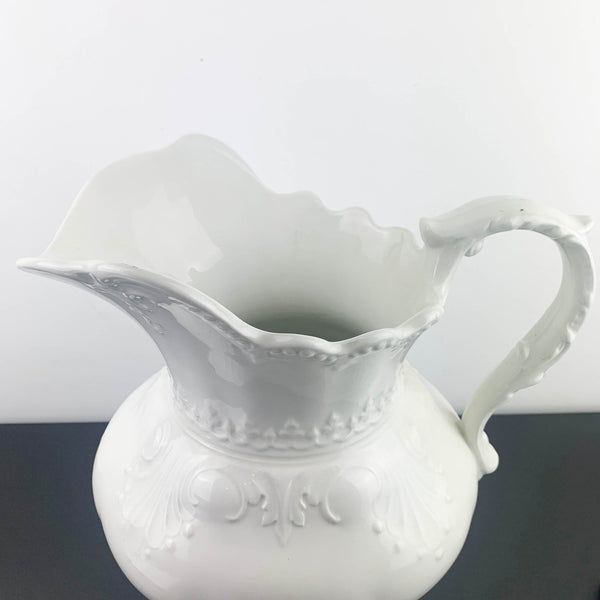 Large embossed ceramic wash jug