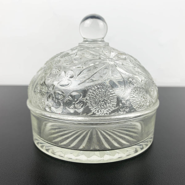 Glass butter dish with domed embossed floral lid