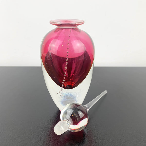 Art glass perfume bottle in pink by Michael Hook