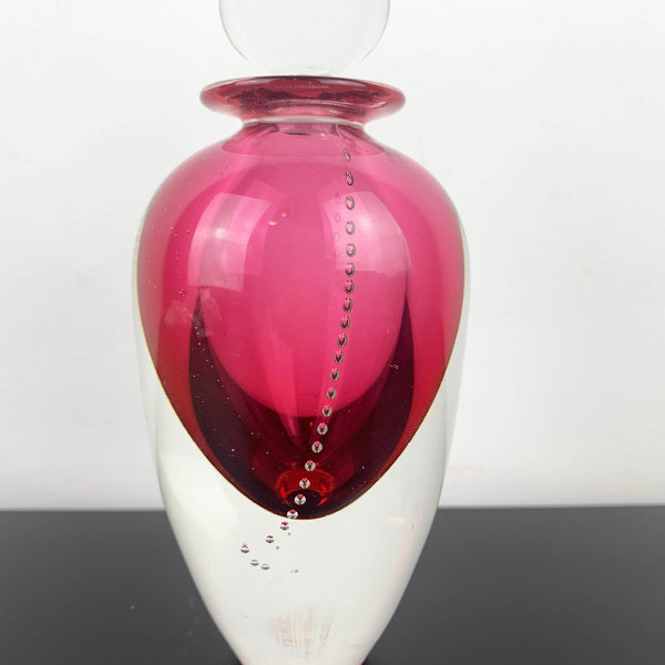 Art glass perfume bottle in pink by Michael Hook
