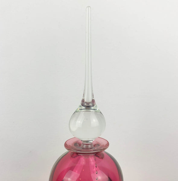 Art glass perfume bottle in pink by Michael Hook