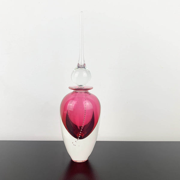 Art glass perfume bottle in pink by Michael Hook