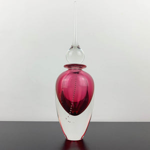 Art glass perfume bottle in pink by Michael Hook